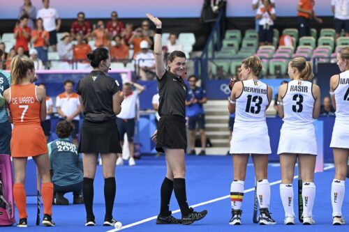 Hannah with the teams, waving to the crowd for her Golden Whistle.