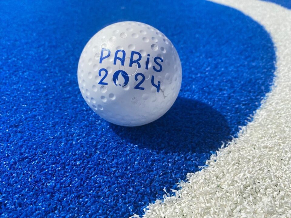 A hockey ball on the blue pitch at Yves du Manoir stadium, in Paris.